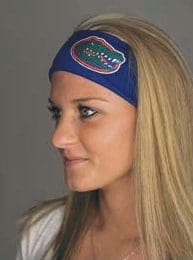 A woman wearing a florida gators headband.