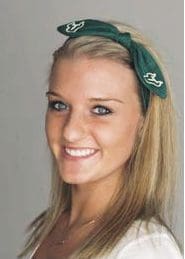 A young woman wearing a green headband.